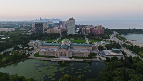 Aerial-view-around-the-Museum-of-Science-and-Industry,-sunny-morning-in-Chicago