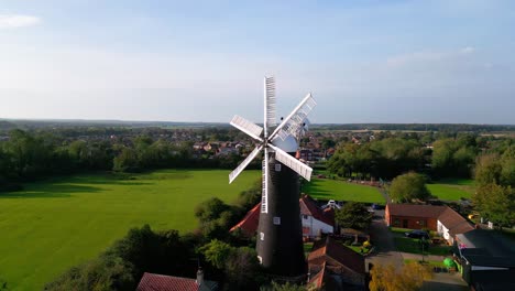 Aerial-video-displays-the-beauty-of-the-well-known-Waltham-Windmill-and-Rural-History-Museum-in-Lincolnshire,-UK