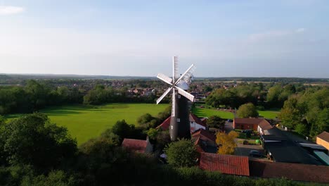 Aerial-footage-provides-a-bird's-eye-view-of-the-famous-Waltham-Windmill-and-Rural-History-Museum-in-Lincolnshire,-UK