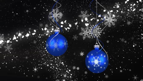 Animation-of-christmas-bubbles-over-stars-and-snow-on-black-background