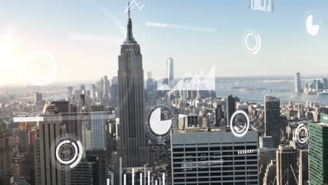 Animation-of-multiple-graphs,-loading-bars-and-circles-over-aerial-view-of-city-against-cloudy-sky