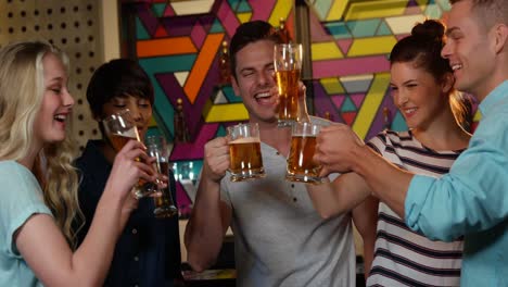 Group-of-friends-toasting-glass-of-beers