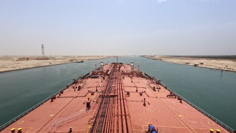 Timelapse-oil-tanker-max-bow-transit-crossing-Suez-canal-sunny-day