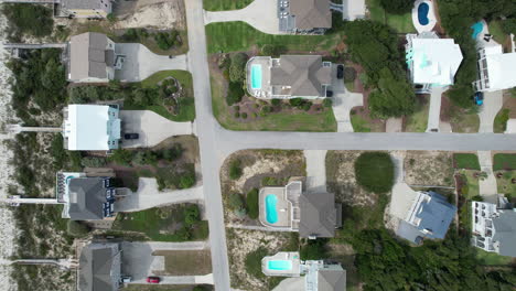 Downward-angle-drone-shot-of-beach-homes