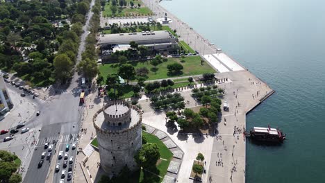 Aerial-Shot-of-Thessaloniki-White-Tower-on-a-Bright-Day---4K-Video