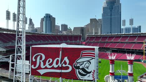 Reds-baseball-stadium-with-iconic-"Reds"-banner-in-foreground