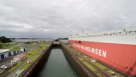 Time-lapse-oil-tanker-stern-panama-canal-crossing-transit-Miraflores-locks-cloudy