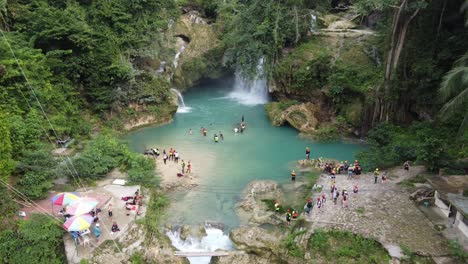 Tourists-Canyoneer-groups-finishing-Badian-Canyoneering-at-Kawasan-Falls-with-a-swim-in-natural-blue-lagoon