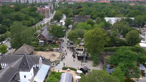 Copenhagen-zoo---High-angle-view-looking-down-at-entrance-and-people-walking-around-in-park