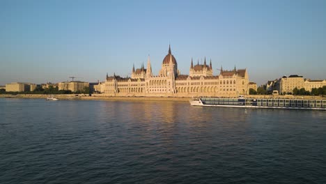 Forward-Drone-Shot-Approaches-Hungarian-Parliament-Above-Danube-River