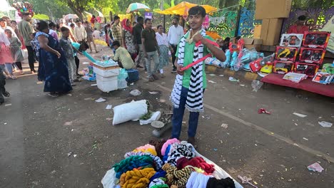 A-shopkeeper-is-selling-clothes-on-the-road