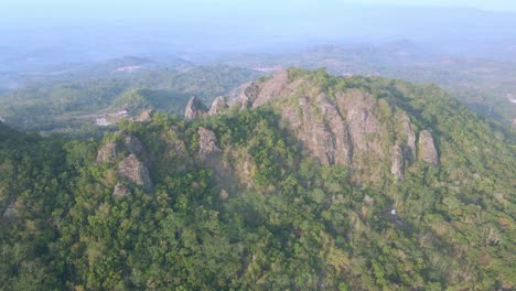 Historic-volcano-of-Nglangeran-in-Indonesia,-aerial-drone-view
