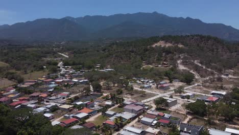 Rotating-aerial-over-small-mountain-town-of-Gracias,-Honduras