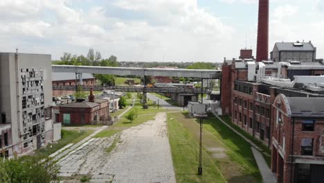 Aerial-view-of-a-historic-sugar-factory-in-Żnin,-Poland