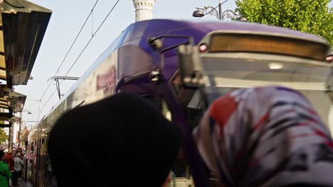 Electric-passenger-tram-arrives-at-busy-Sultanahmet-tourist-district