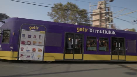 Istanbul-passenger-tram-arrives-at-busy-Sultanahmet-tourist-district
