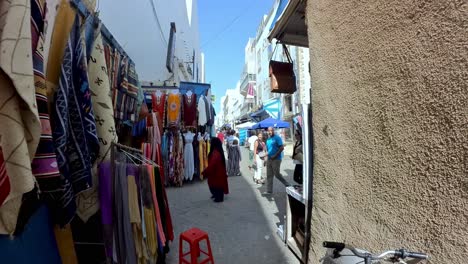 Essaouira,-Morroco-Footage:-As-you-wander-the-narrow-streets-of-Essaouira,-you'll-be-transported-back-in-time,-with-each-winding-alley-revealing-a-piece-of-the-city's-rich-history