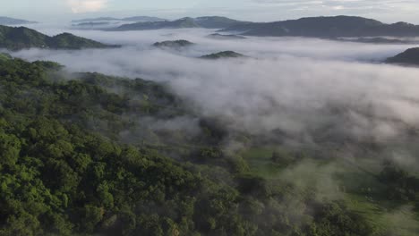 Sunset-Afternoon-Fog-Over-Costa-Rica-Jungle,-Aerial-Drone-4K-Flyover