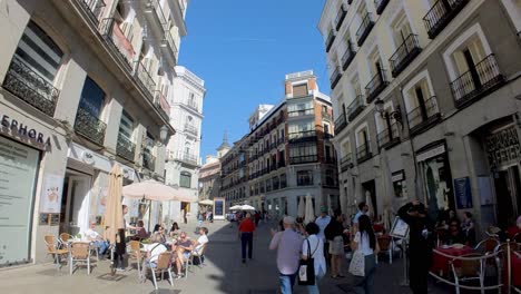 Madrid,-Spain:-Experience-the-heart-of-Madrid-with-a-gimbal-shot-down-Gran-Via,-where-the-city's-pulse-and-culture-come-alive