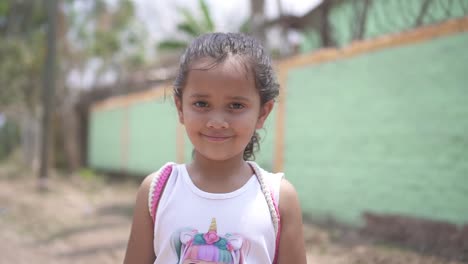 c-standing-outside-a-school-during-a-medical-brigade