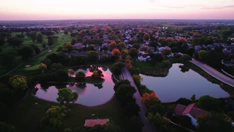 Aerial-over-Deerfield,-located-in-the-picturesque-state-of-Illinois,-USA,-an-charming-suburban-town-that-effortlessly-blends-the-tranquility-of-nature-with-the-convenience-of-modern-living