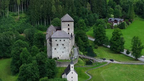Journey-back-into-medieval-times-the-impressive-Kaprun-Castle,-aerial