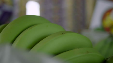 moving-shot-of-bunch-of-fresh-bananas-at-customs