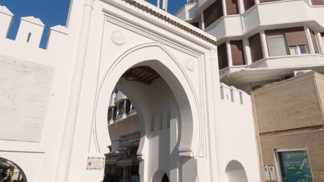 Vibrant-scene-at-Bab-El-Fahs-gate-in-Tangier,-Morocco