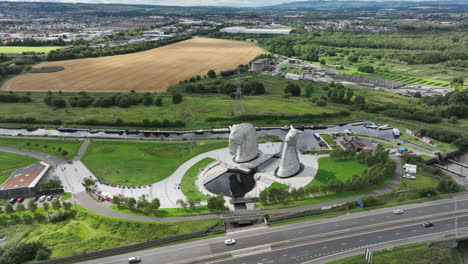 4K-aerial-Orbit-around-the-The-Kelpies,-the-largest-quine-sculptures-in-the-world