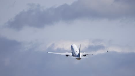 Tracking-Shot-from-Behind-of-a-Departing-Westjet-737-After-Takeoff