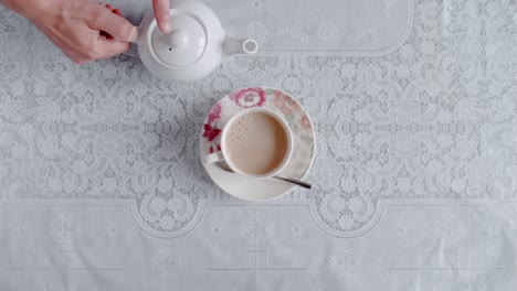 Tea-is-poured-into-a-teacup