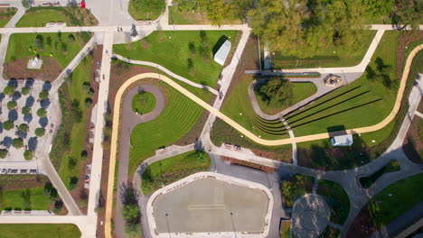 Aerial-bird's-eye-view-above-Park-Centralny-in-Gdynia-Poland,-sidewalks-around-social-infrastructure