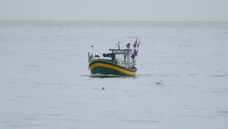 4K-Slow-Motion:-Fishing-Boat-Returning-to-Harbour-on-Open-Water