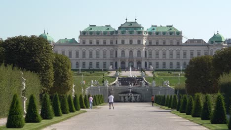People-Walking-in-the-Distance-of-Upper-Belvedere-Palace-on-a-Sunny-Day