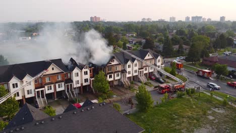Aerial-View-Of-Smoke-From-Residential-Apartment-Burning-In-Daylight