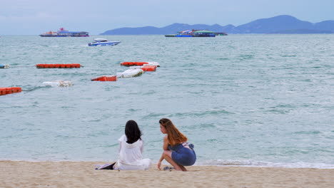 A-couple-relaxing-on-Pattaya-beach