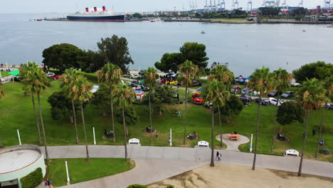 Aerial-view-of-a-car-show-at-the-ShoreLine-Aquatic-Park-of-Long-beach