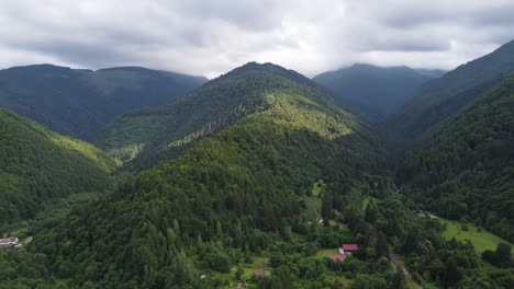 Pull-back-drone-footage-of-Fagaras-Mountains,-Romania