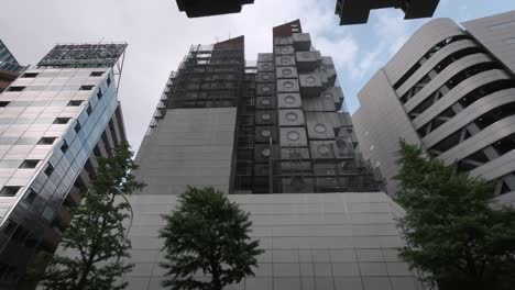 The-Nakagin-Capsule-Tower-Building-being-demolished-view-from-under-the-highway-look-up-angle