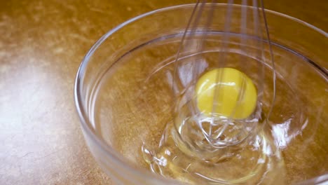 Whipped-eggs-with-a-mixer.-Slow-motion-with-rotation-tracking-shot.