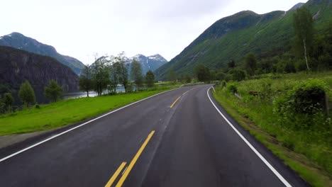 Driving-a-Car-on-a-Road-in-Norway