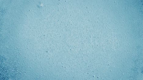 Oxygen-bubbles-in-water-on-a-blue-abstract-background