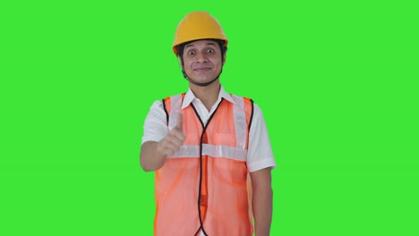 Happy-Indian-architect-showing-thumbs-up-Green-screen