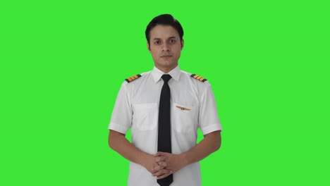 Indian-male-pilot-looking-at-the-camera-Green-screen