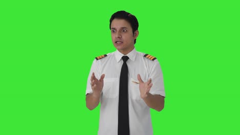Angry-Indian-male-pilot-shouting-Green-screen