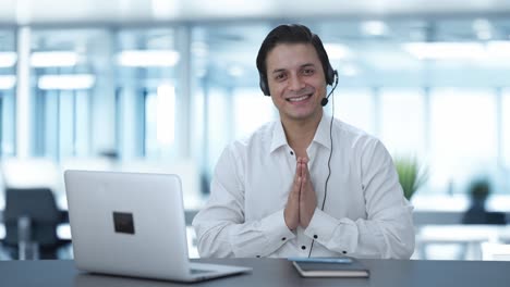 Happy-Indian-call-center-employee-doing-Namaste-and-greetings