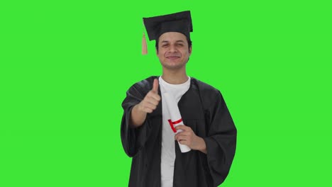 Happy-Indian-college-student-showing-thumbs-up-Green-screen
