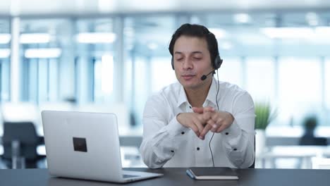 Happy-Indian-call-center-employee-talking-to-customer