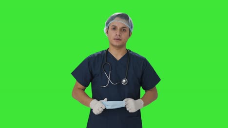 Sad-doctor-removes-mask-after-failed-operation-Green-screen