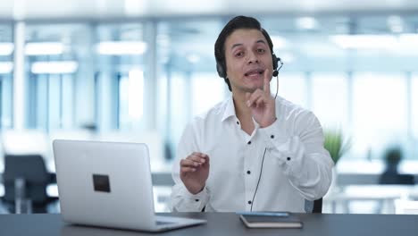 Happy-Indian-call-center-employee-talking